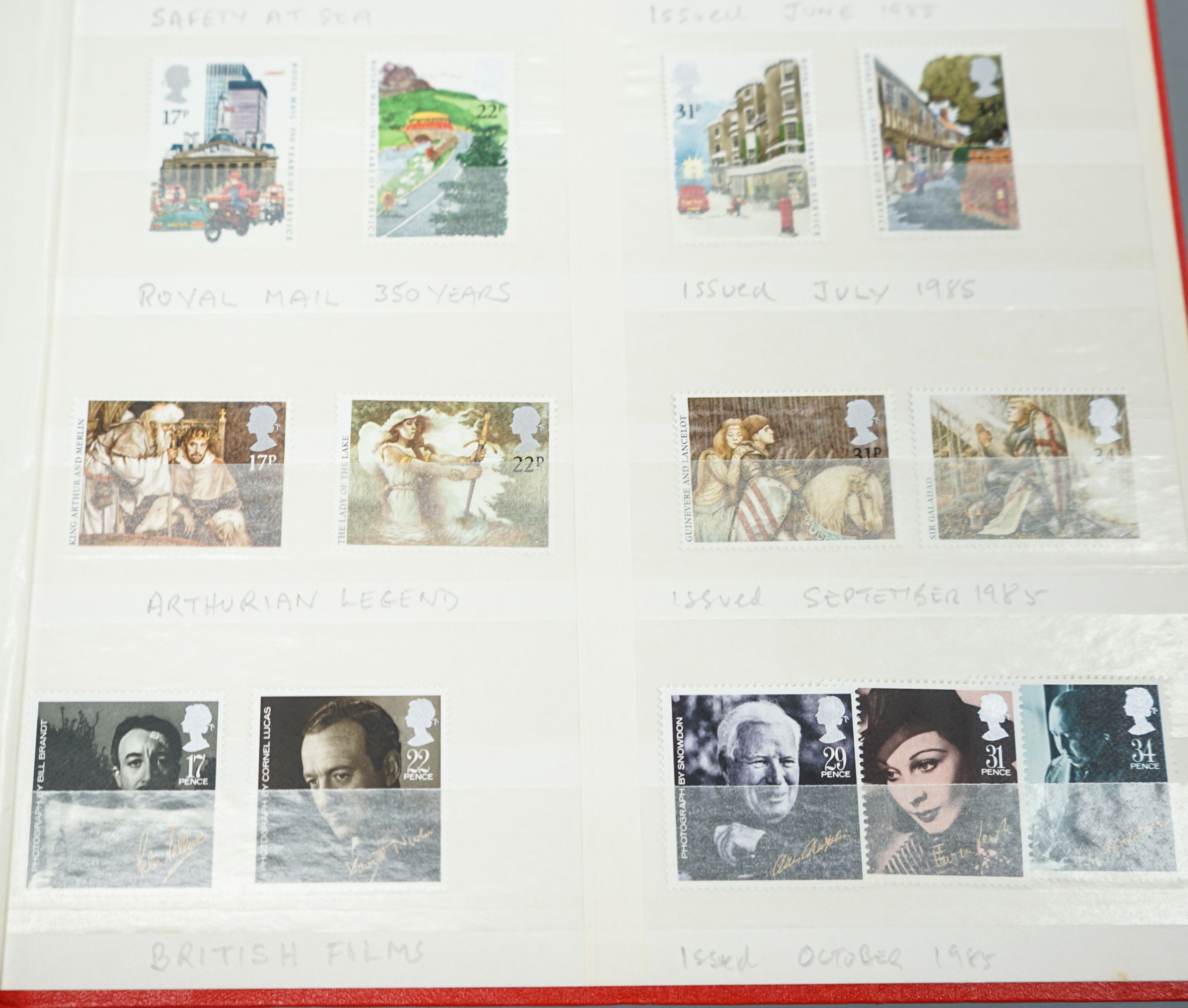 A blue album of George V mounted mint British Commonwealth stamps, one other album and two stock books (4)